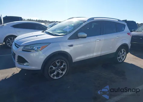 2014 Ford Escape Titanium z USA, uszkodzony, nr VIN 1FMCU9J92EUA51045